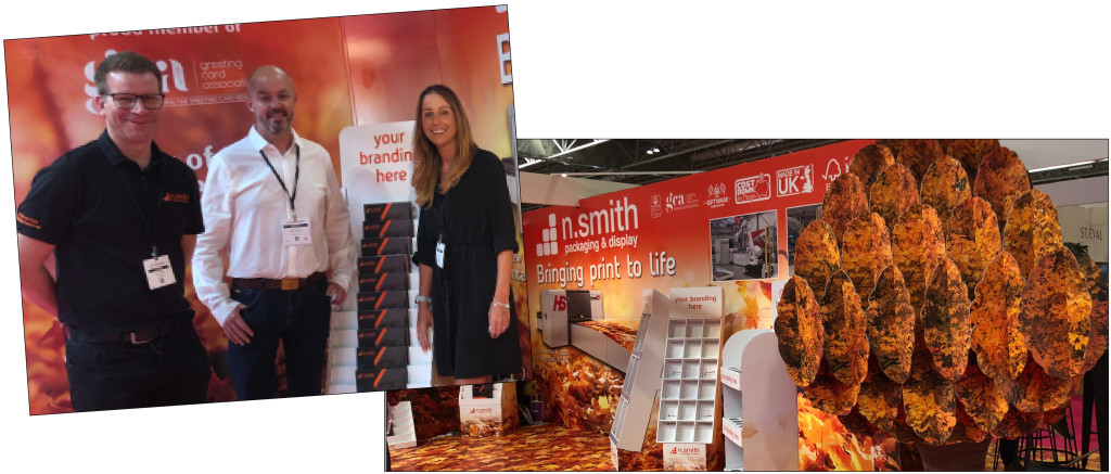 Above & top: N Smith & Co owners (right-left) Kerry Tyers, Nigel Reynolds and Steve Wilkinson, on their Autumn Fair stand which incorporated an image of its new printer and the cardboard tree in autumnal foliage the company made