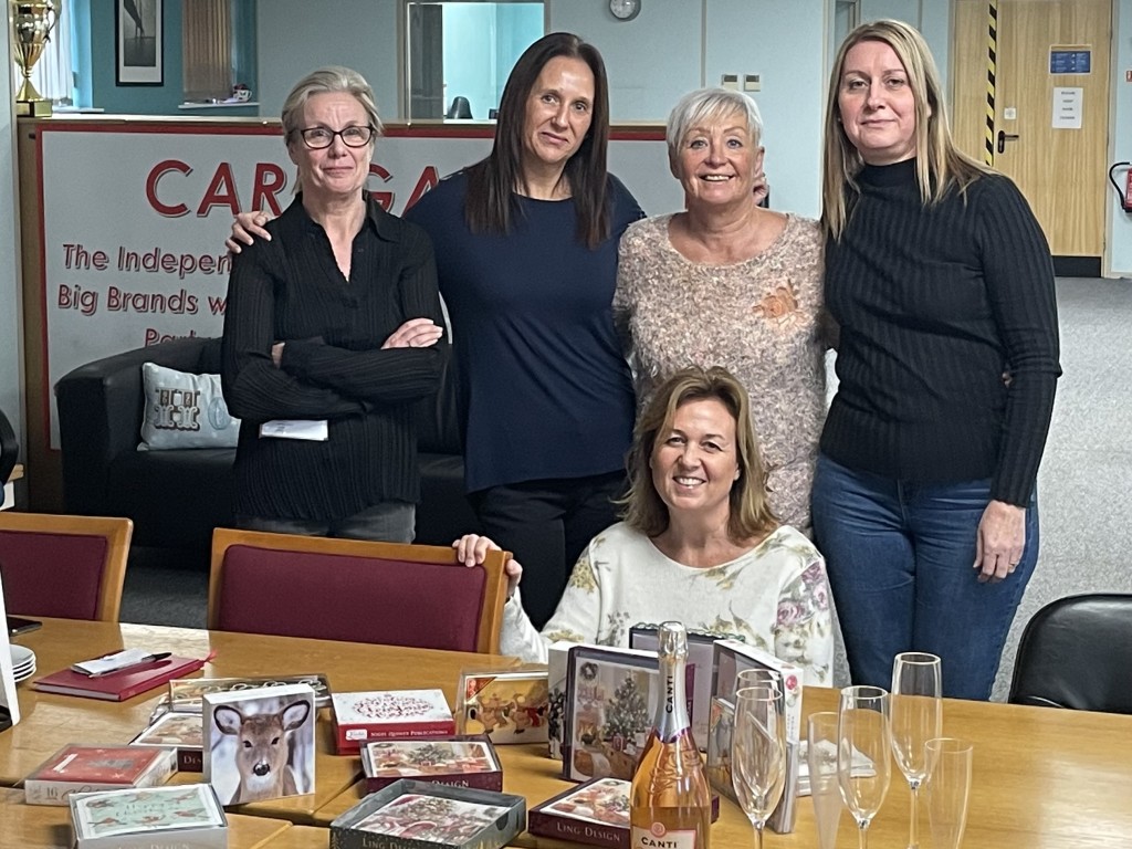 Above: Helen McManus (front) with (from left) Melanie Craine, Nicola Buck, Deborah Beedham, and Kerry Barrett at Cardgains’ Festive Friday event