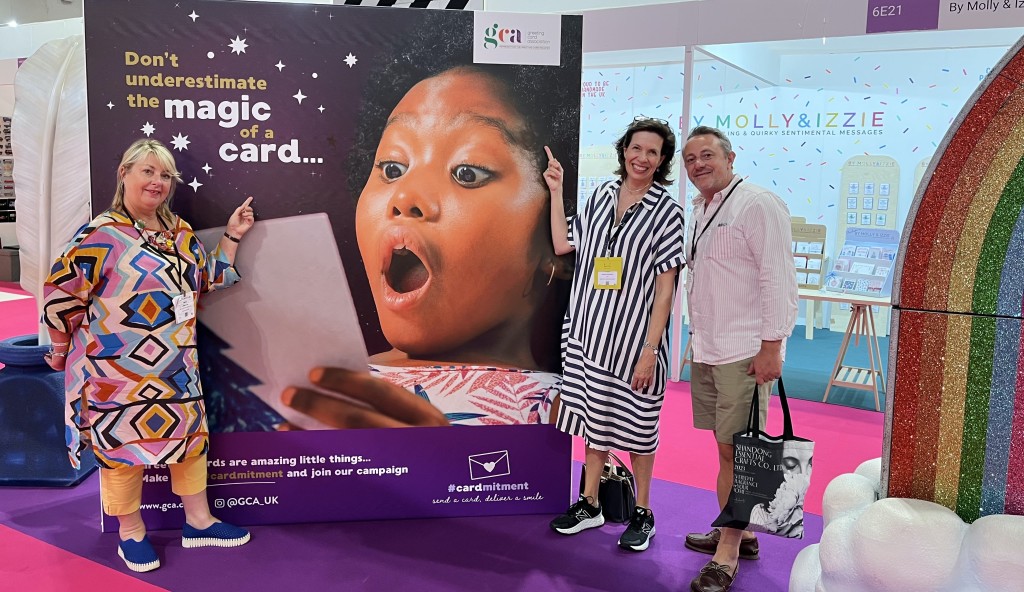 Above: The GCA’s area at Autumn Fair was a bright example of the card-sending message, as Amanda Fergusson (centre) shows with PG’s Jakki Brown and Mark Rees, owner of Midlands-based retail chain Henry & Co