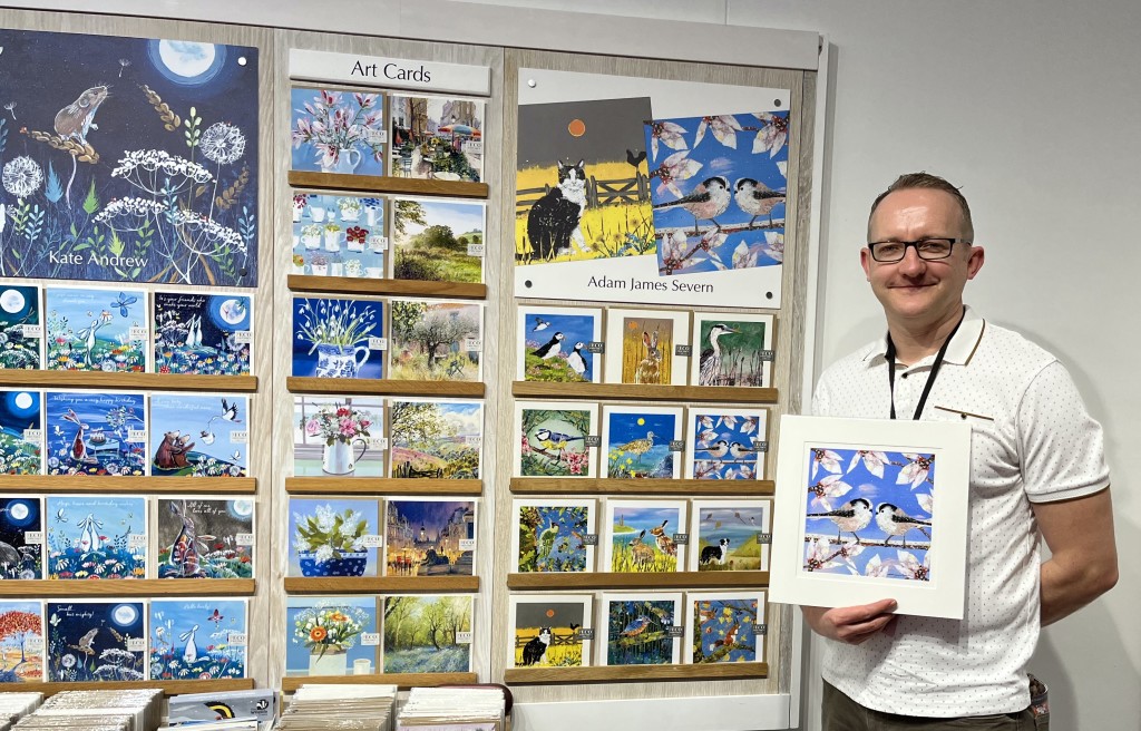 Above: Artist and retailer Adam James Severn with his prize signed print