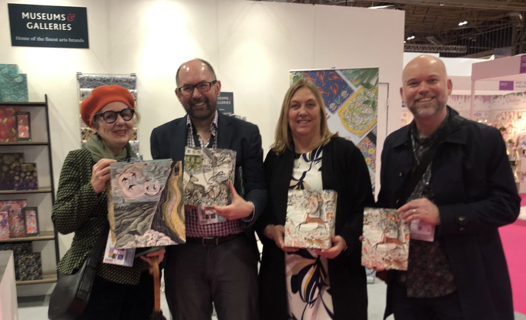 Above & top: M&G’s licensing director Eddie Clarke, co-owner Debbie Williams, and Stuart Harris, head of design, with Angela Harding (left) one of the latest artists to join the company’s licensor roster